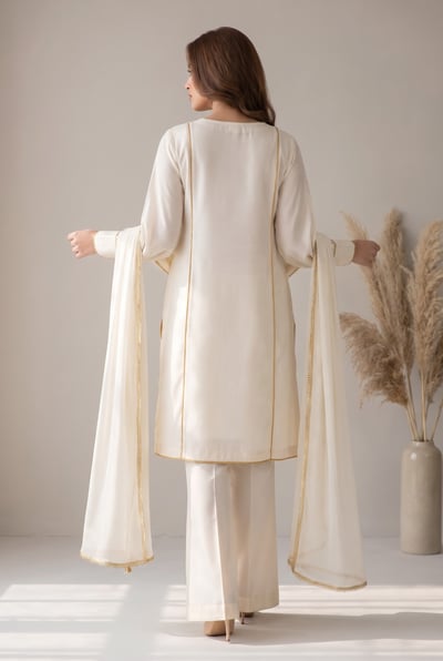 Jia ivory silk 3 piece suit showing back calf-length flared silhouette, back view
